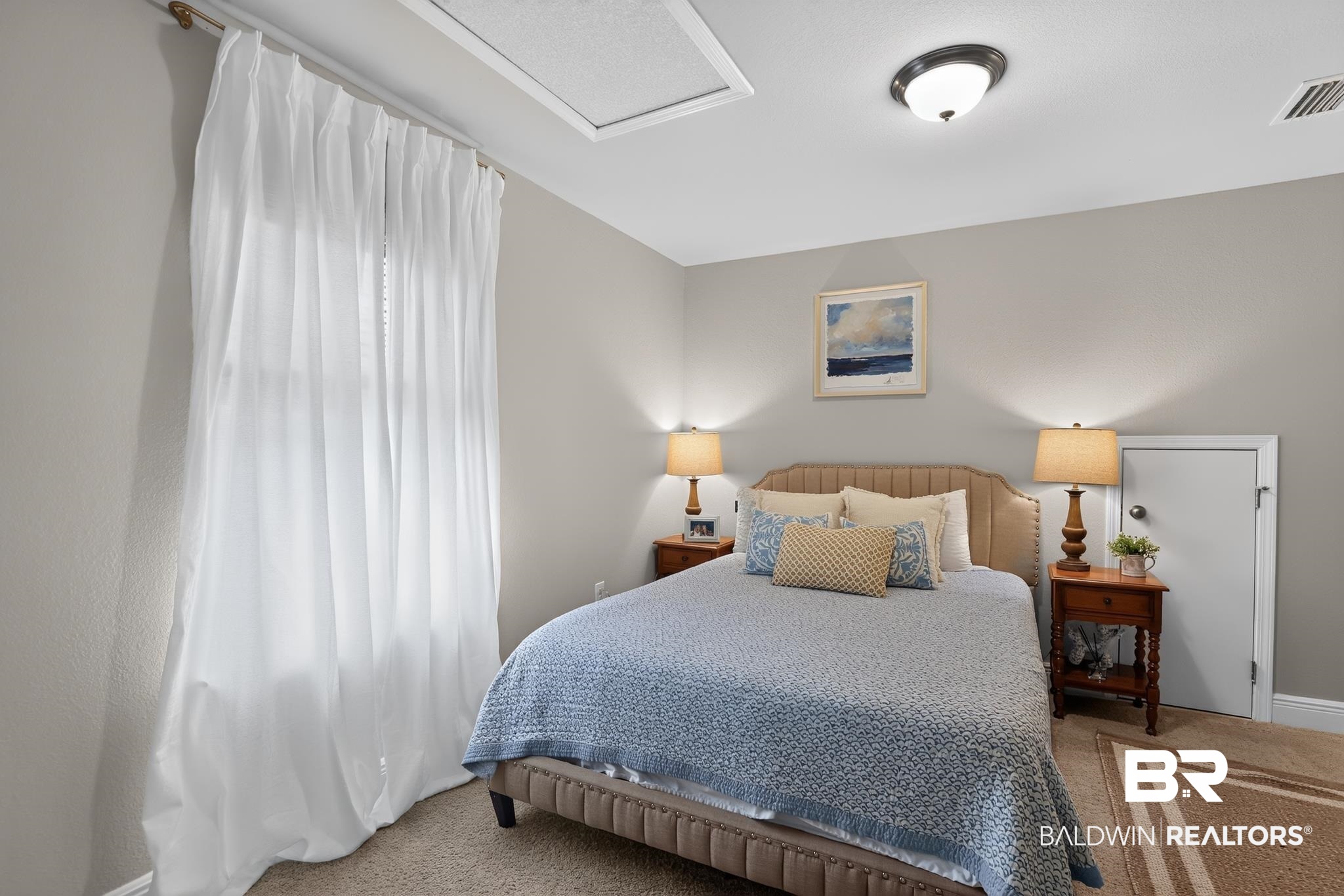 1210 Primrose Lane Foley, AL 36535 - Photo 16 of 33 Neutral wall tones complement the plush carpet flooring