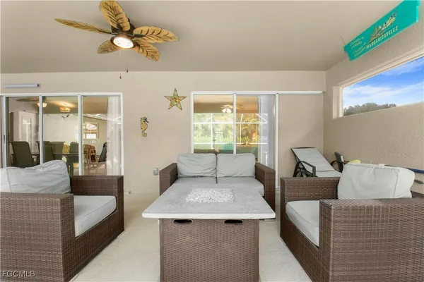 a living room with furniture and a window