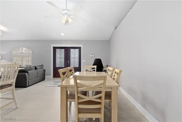 a view of a dining room with furniture