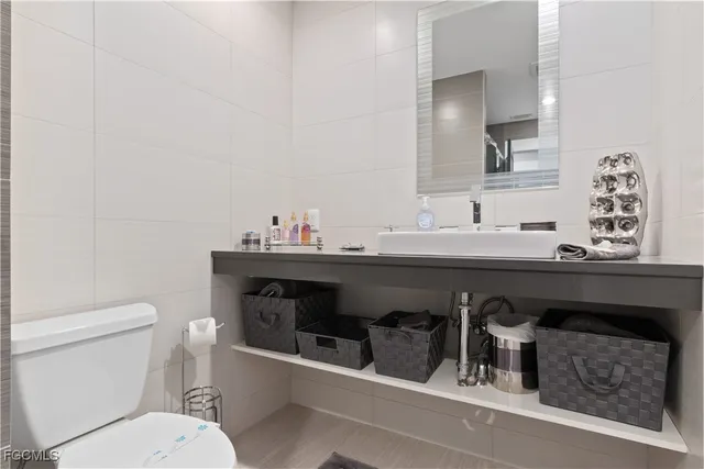 a bathroom with a sink and a toilet