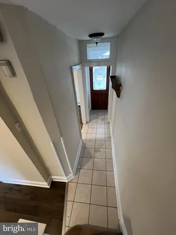 a view of hallway with windows