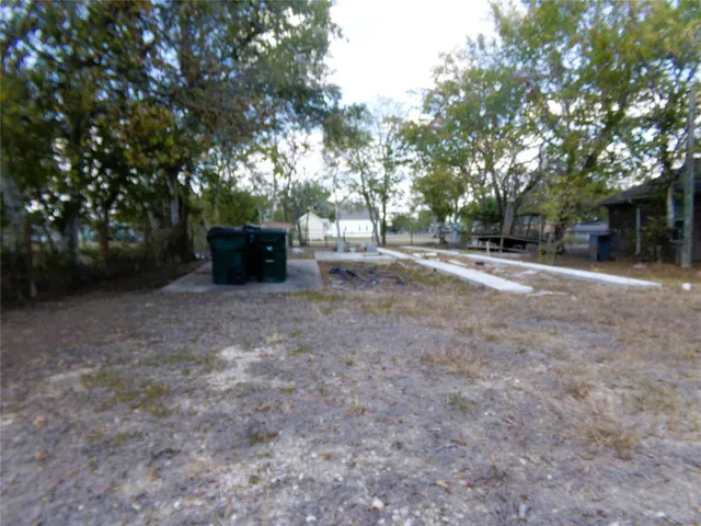 a view of a house with a tree