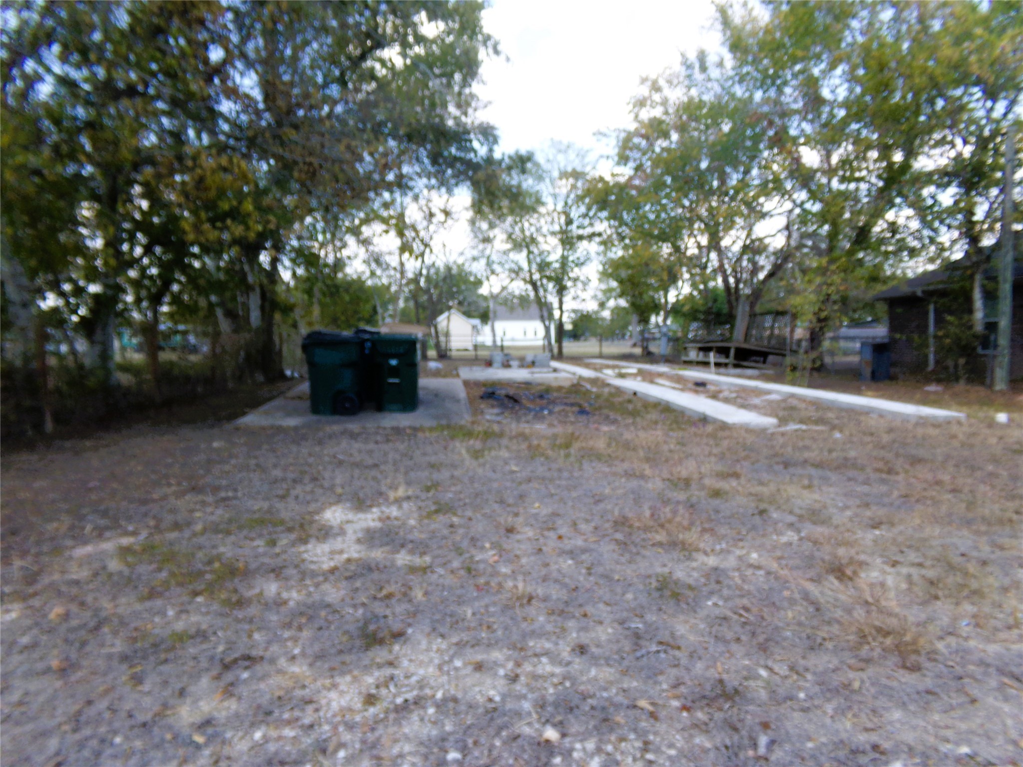 409 East Post Office Street Weimar, TX 78962 - Photo 1 of 2 a view of a house with a tree