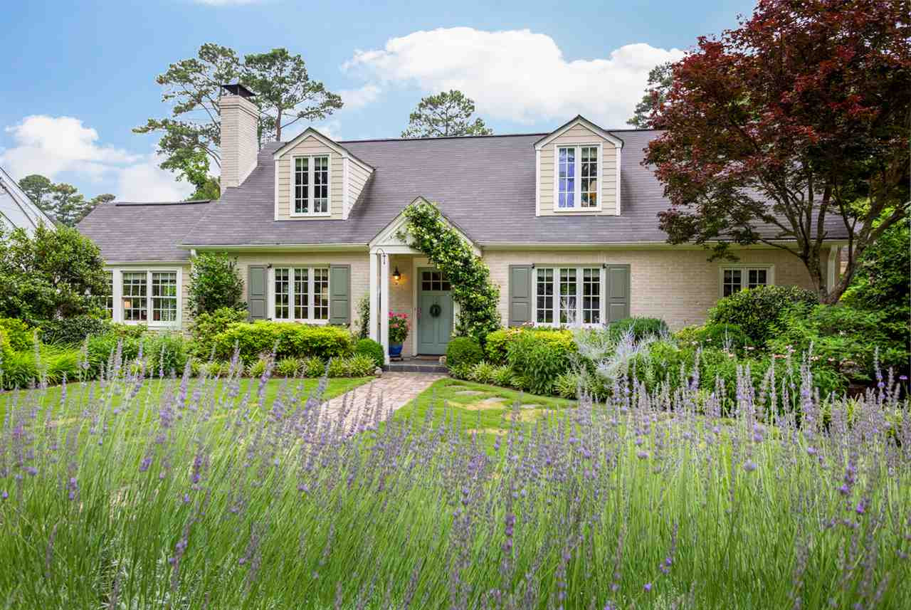 1321 Brooks Avenue Raleigh, NC 27607 - Photo 6 of 30 No shortage of curb appeal starting with a fabulous smelling French lavender hedge! Front Facade view