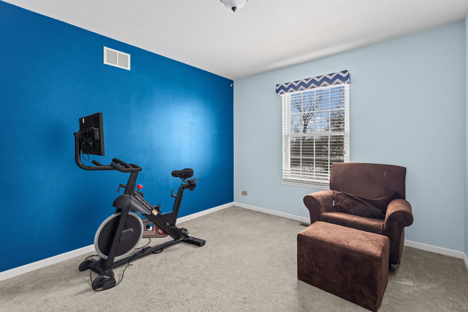 16703 South Sunset Ridge Court Lockport, IL 60441 - Photo 12 of 15 a room with furniture wall windows and a couch
