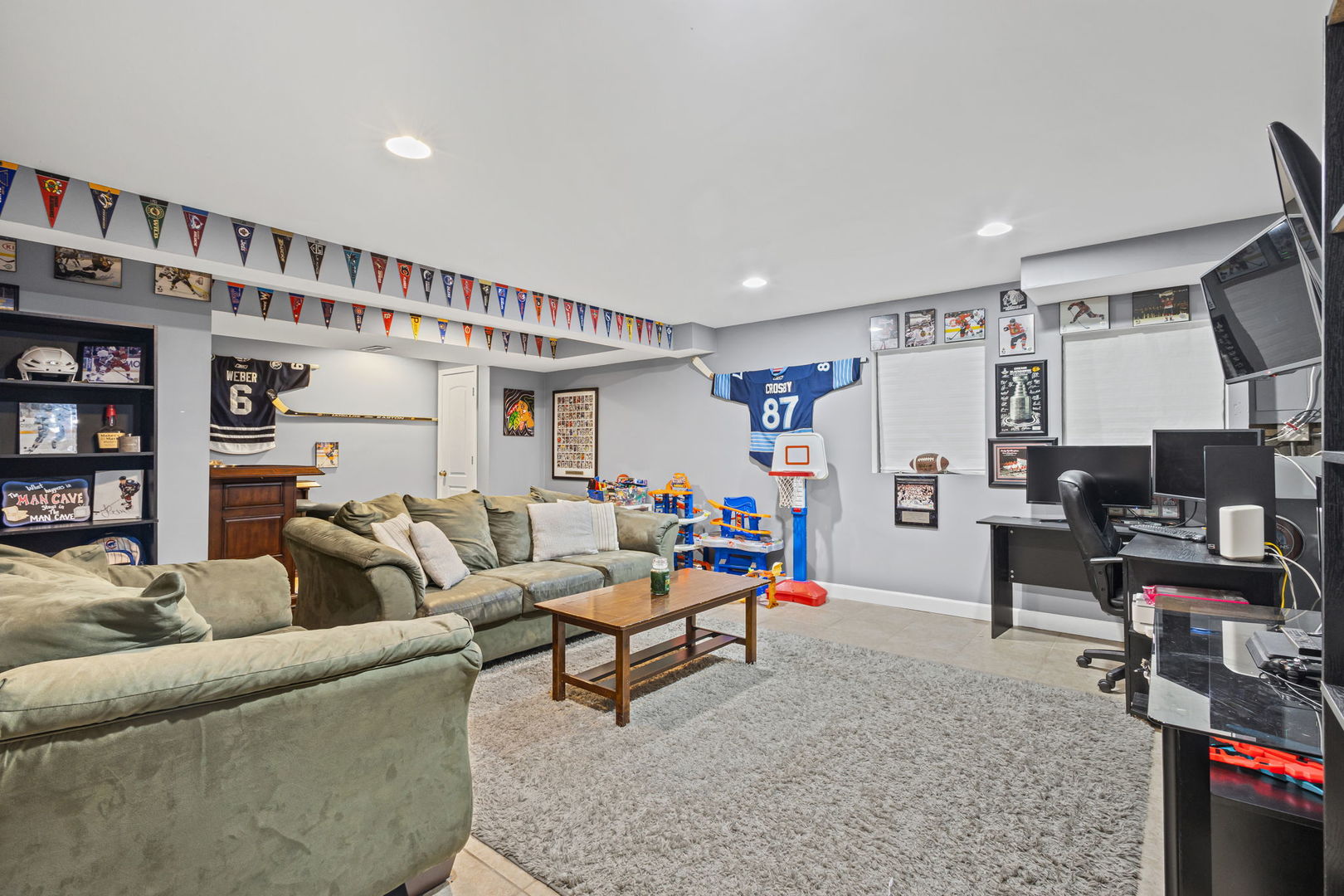 16703 South Sunset Ridge Court Lockport, IL 60441 - Photo 15 of 15 a living room with furniture and a book shelf