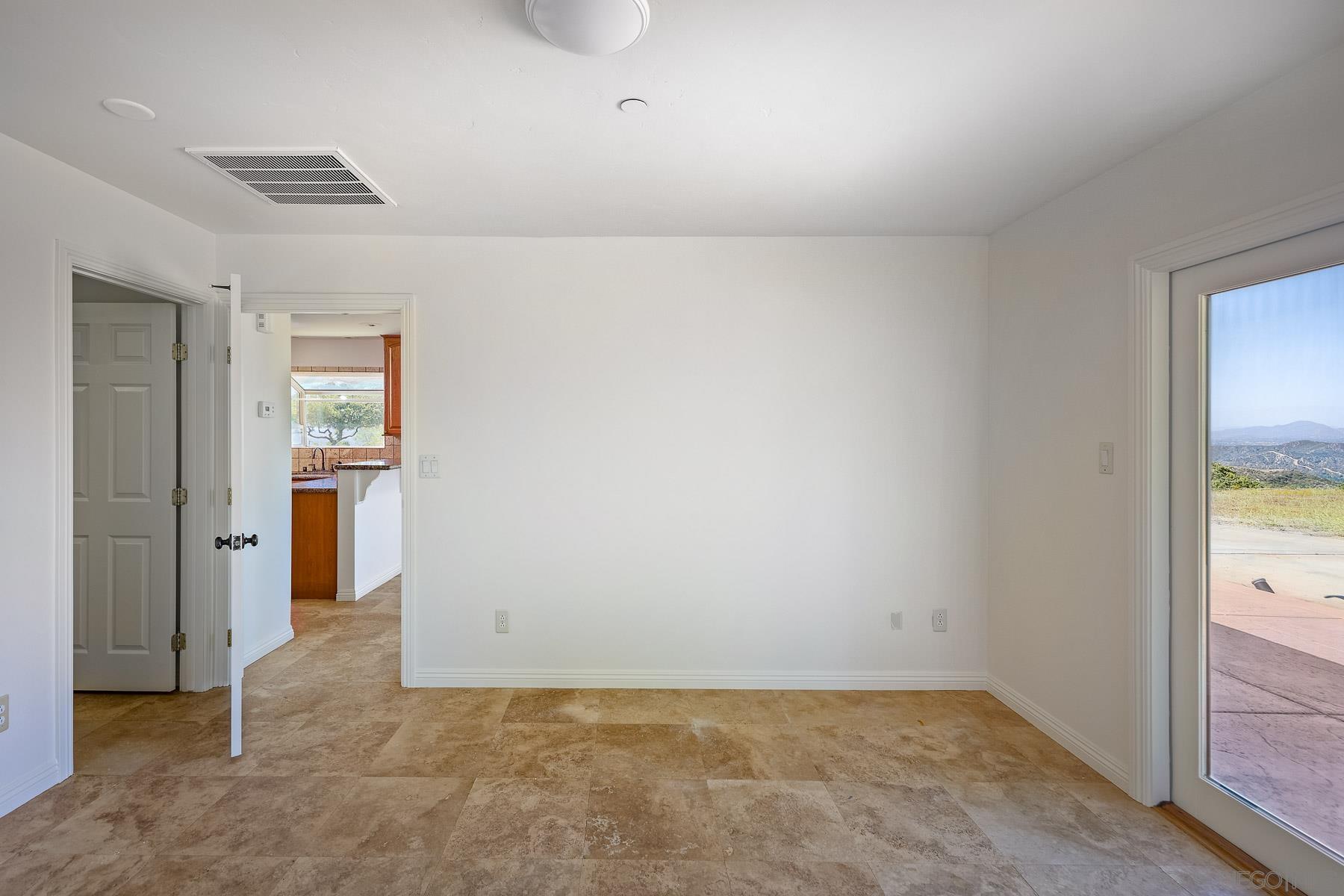 38960 Magee Road Pala, CA 92059 - Photo 12 of 25 an empty room with windows