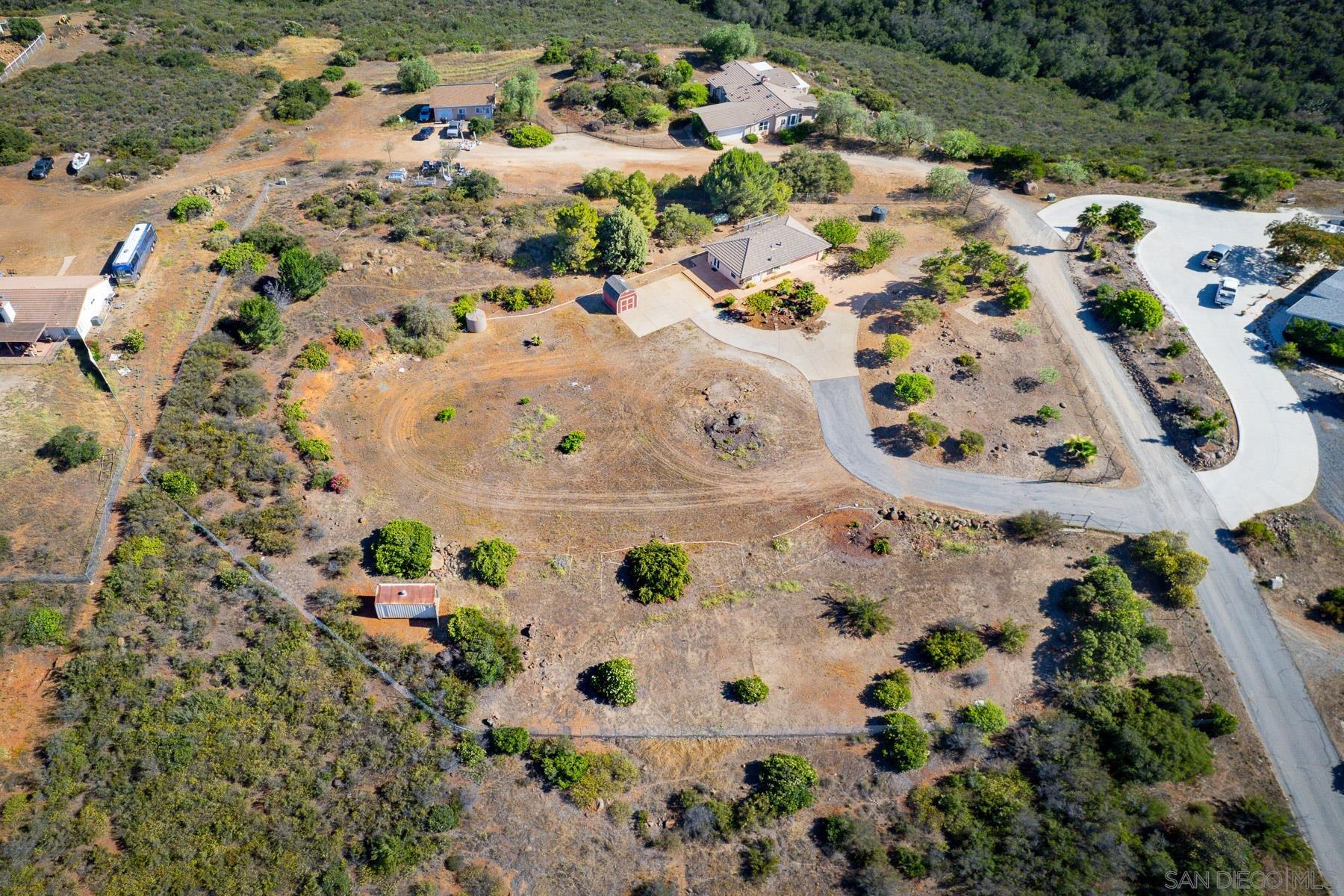 38960 Magee Road Pala, CA 92059 - Photo 23 of 25 an aerial view of a house with a lot of flowers