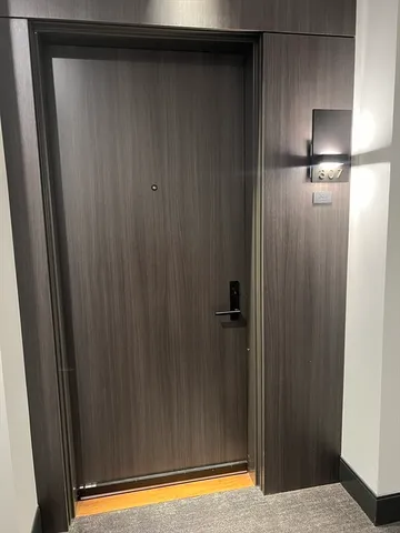 a view of a living room and a wooden floor