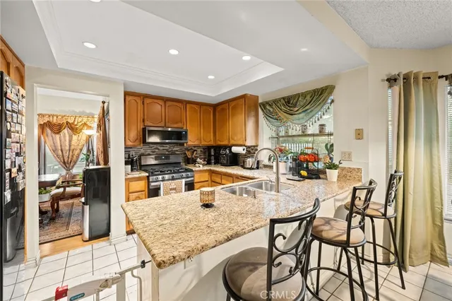 a kitchen with lots of counter top space and a sink