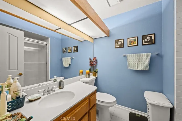 a view of a hallway with bathroom