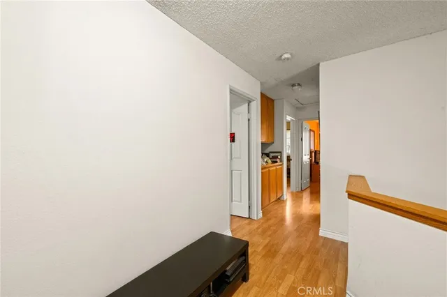 a view of a backyard with sitting area and tree s