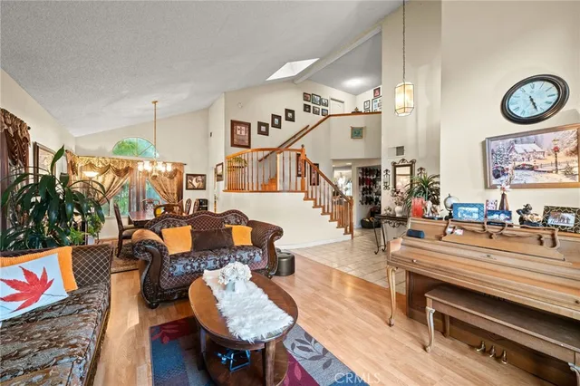 a dining hall with granite countertop a sink and chairs