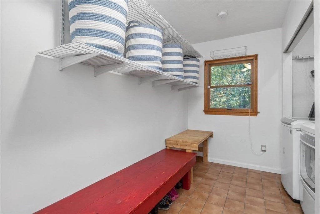 58 High Street Medfield, MA 02052 - Photo 12 of 41 a view of a room with a projector and a window