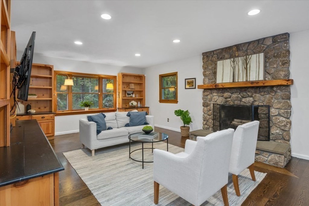 58 High Street Medfield, MA 02052 - Photo 18 of 41 a living room with furniture and a fireplace