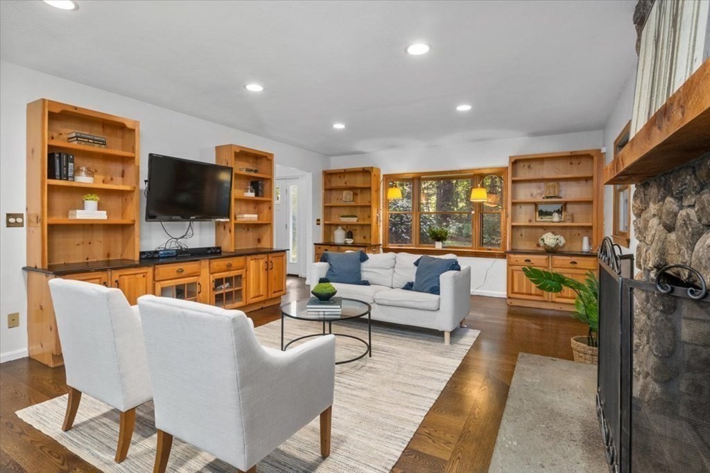 58 High Street Medfield, MA 02052 - Photo 19 of 41 a living room with fireplace furniture and a flat screen tv