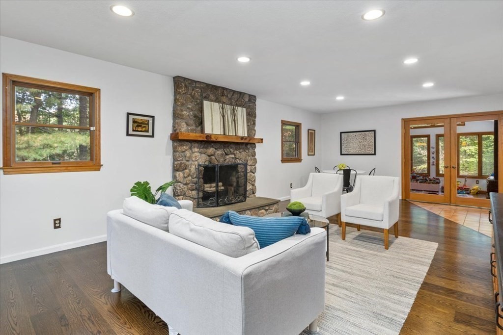 58 High Street Medfield, MA 02052 - Photo 20 of 41 a living room with furniture and a fireplace