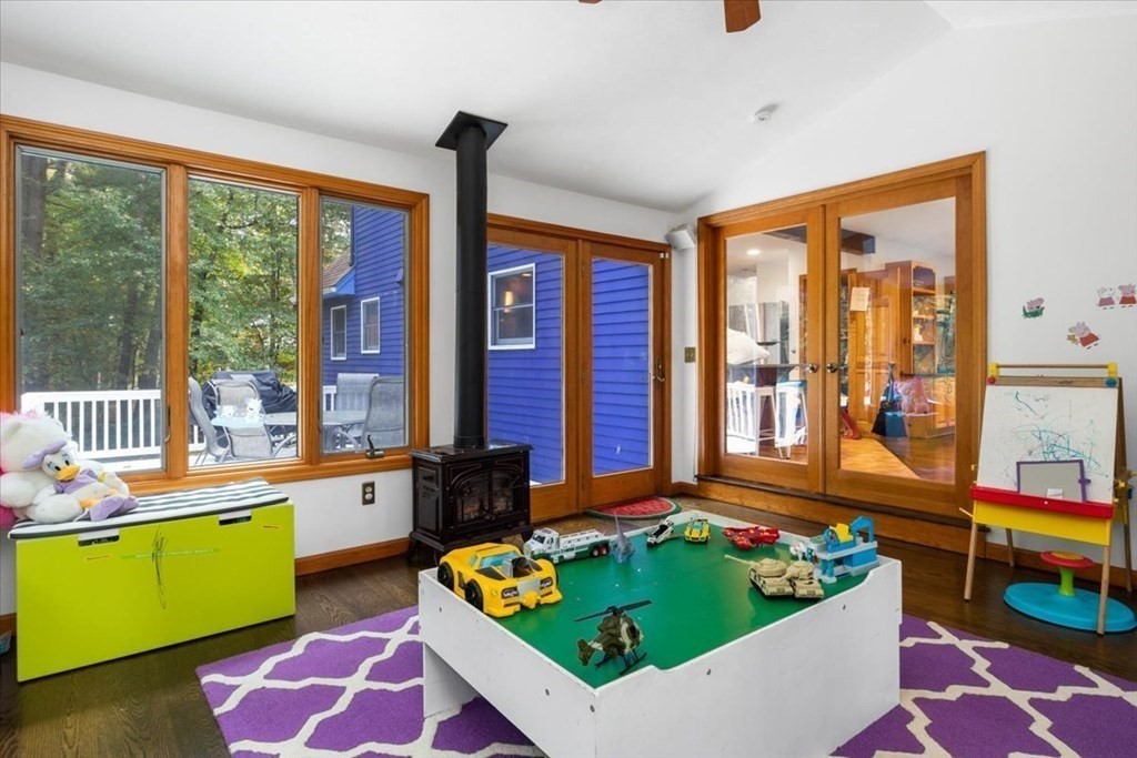 58 High Street Medfield, MA 02052 - Photo 23 of 41 a room with furniture and large windows