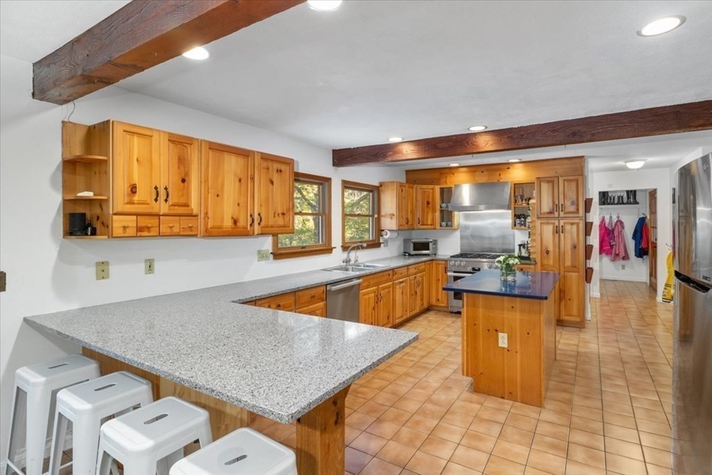 58 High Street Medfield, MA 02052 - Photo 8 of 41 a view of kitchen with a sink cabinets and wooden floor