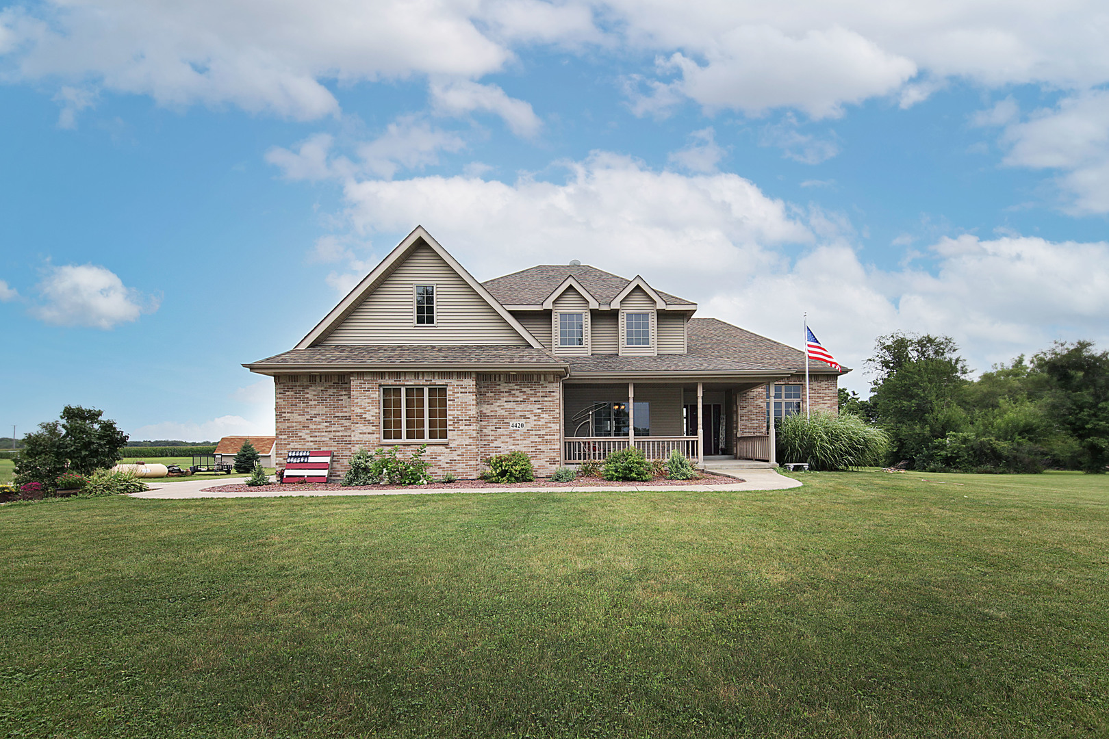 4420 West Shabbona Road Morris, IL 60450 - Photo 1 of 31 a front view of a house with a yard