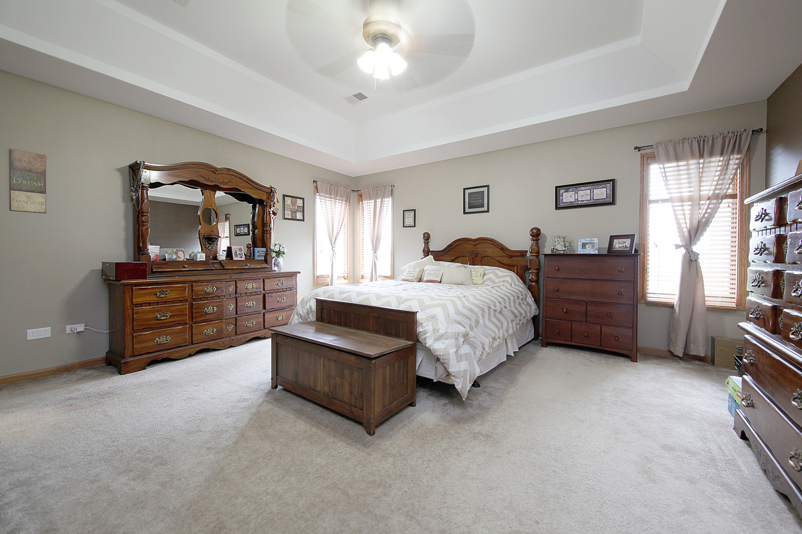 4420 West Shabbona Road Morris, IL 60450 - Photo 16 of 31 a bedroom with a bed dresser and a window