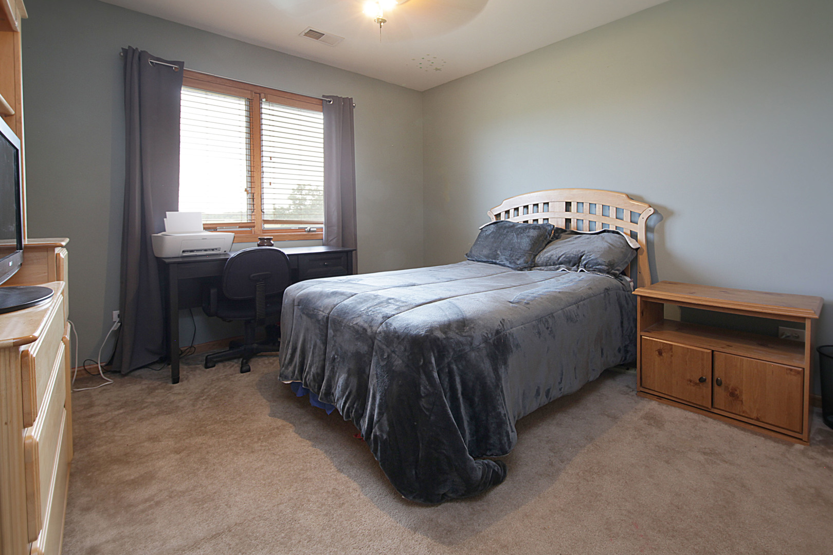4420 West Shabbona Road Morris, IL 60450 - Photo 20 of 31 a bedroom with a bed and a window