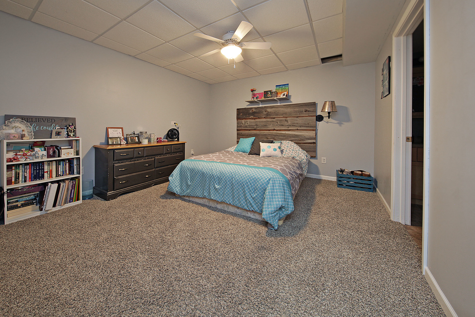 4420 West Shabbona Road Morris, IL 60450 - Photo 25 of 31 a bedroom with a bed and a book shelf