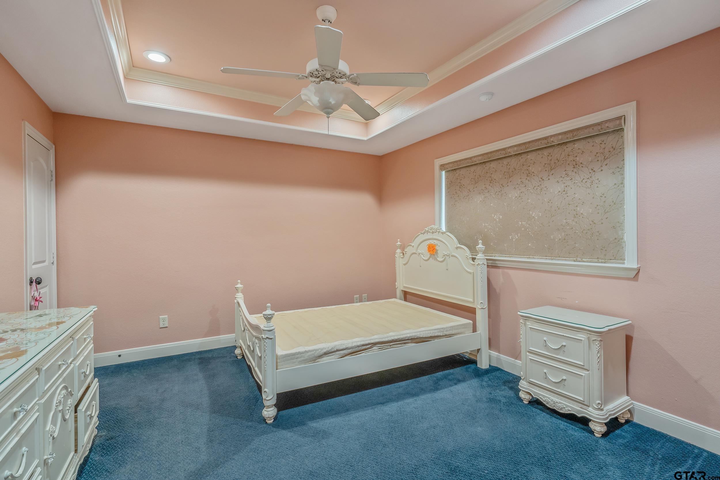 3072 Yasmeen Circle Flint, TX 75762 - Photo 14 of 26 a bedroom with a bed and a cabinets