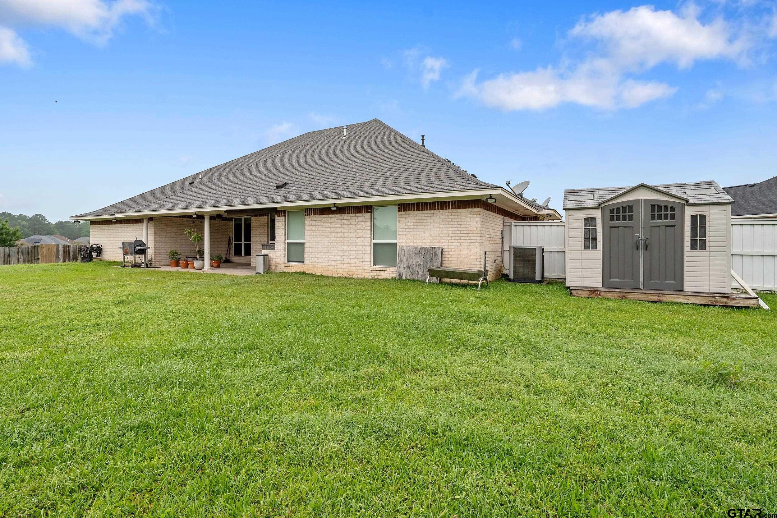 3072 Yasmeen Circle Flint, TX 75762 - Photo 26 of 26 a front view of house with yard and green space