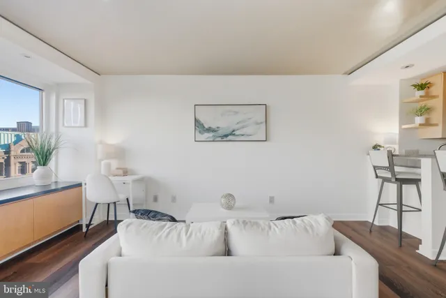 a living room with furniture and a couch