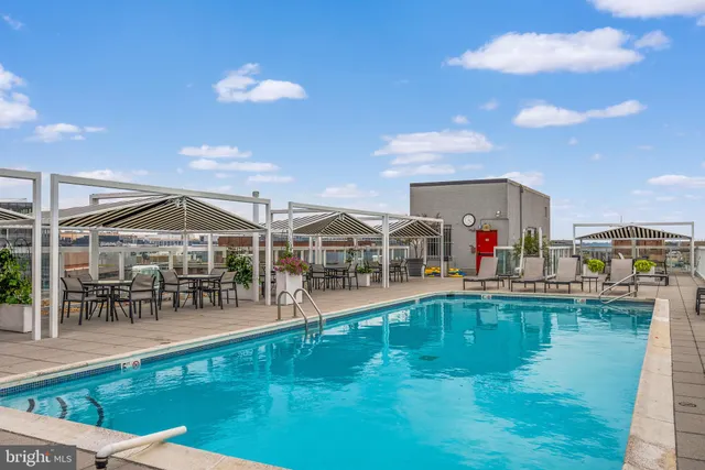 a view of a swimming pool with a terrace