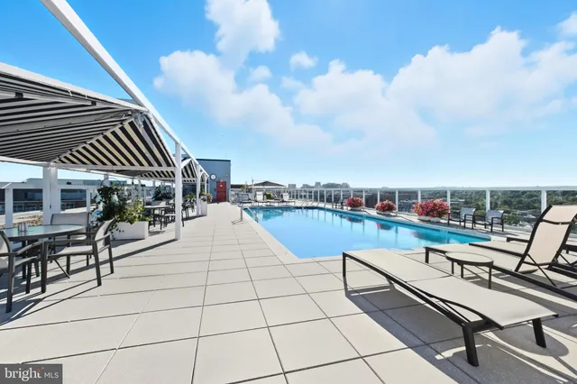 a view of roof deck with seating space