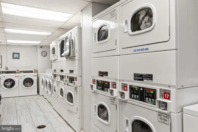 a utility room with dryer and washer