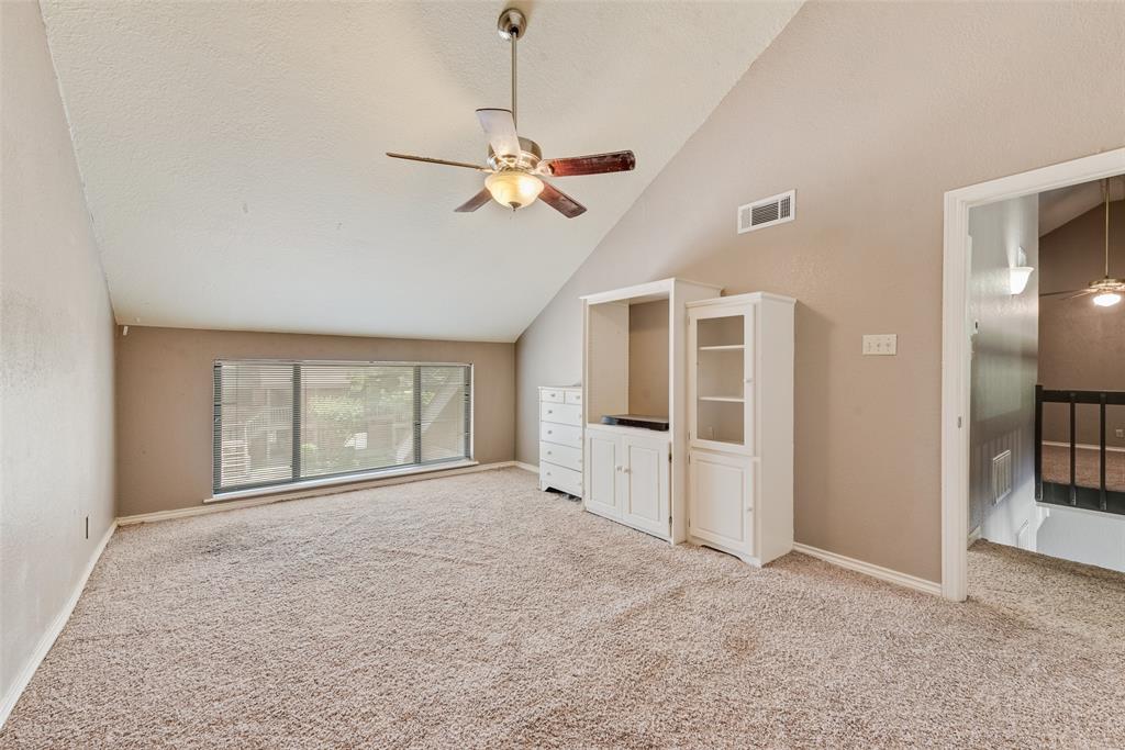 1242 Signal Ridge Place Rockwall, TX 75032 - Photo 18 of 27 a view of empty room with windows and ceiling fan