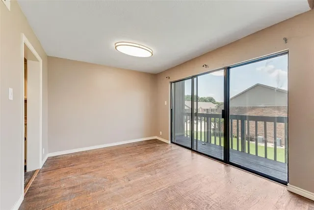 a view of a room with large windows