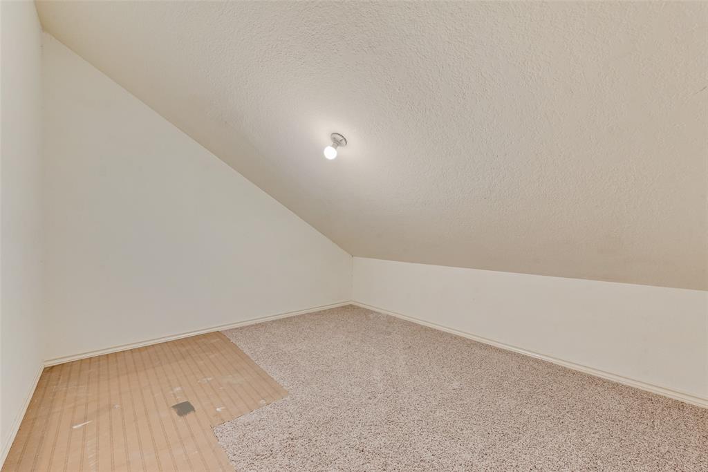 1242 Signal Ridge Place Rockwall, TX 75032 - Photo 9 of 27 a view of an empty room