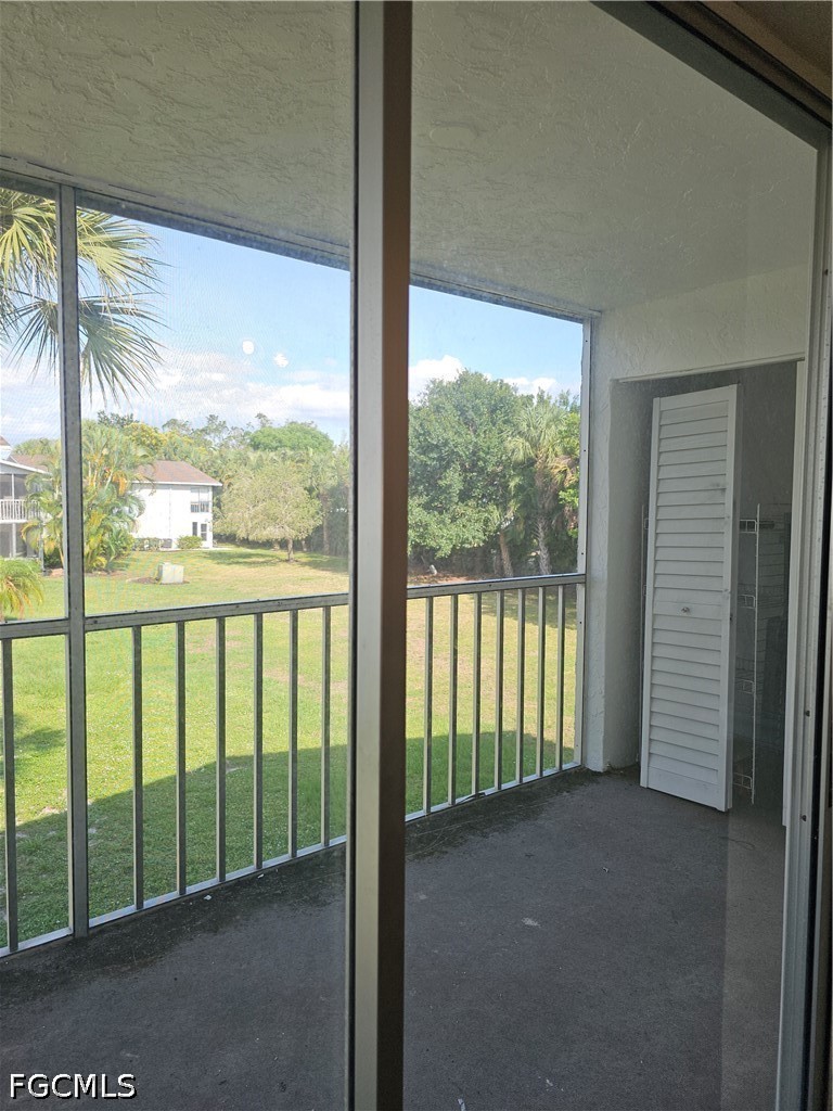 8101 Country Road, Unit 201 Fort Myers, FL 33919 - Photo 16 of 34 a view of a room with large windows