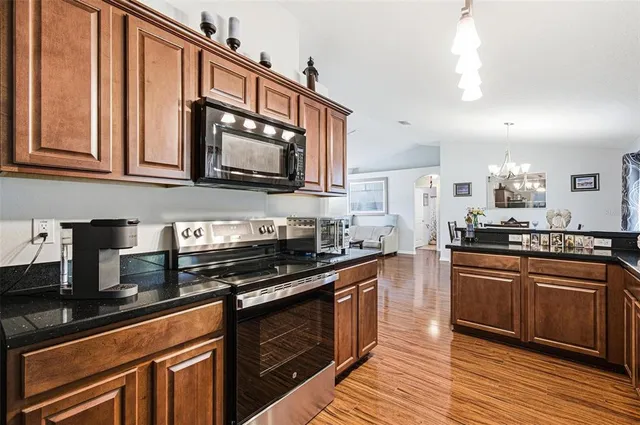 a kitchen with a sink and a window