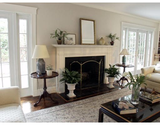 2 Weston Road Lincoln, MA 01773 - Photo 7 of 9 a living room with furniture and a fireplace