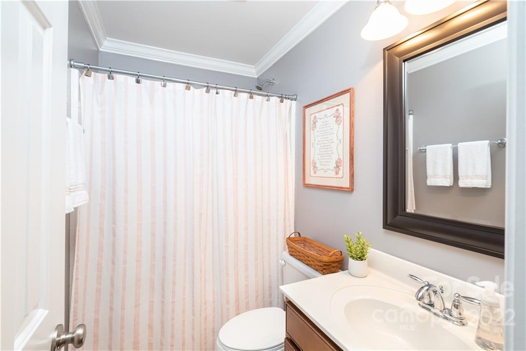 930 Stratford Run Drive Fort Mill, SC 29708 - Photo 18 of 28 a bathroom with a sink toilet and mirror