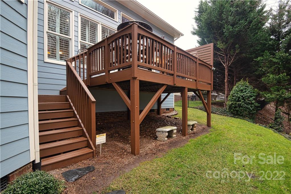 930 Stratford Run Drive Fort Mill, SC 29708 - Photo 21 of 28 a view of a house with backyard and deck