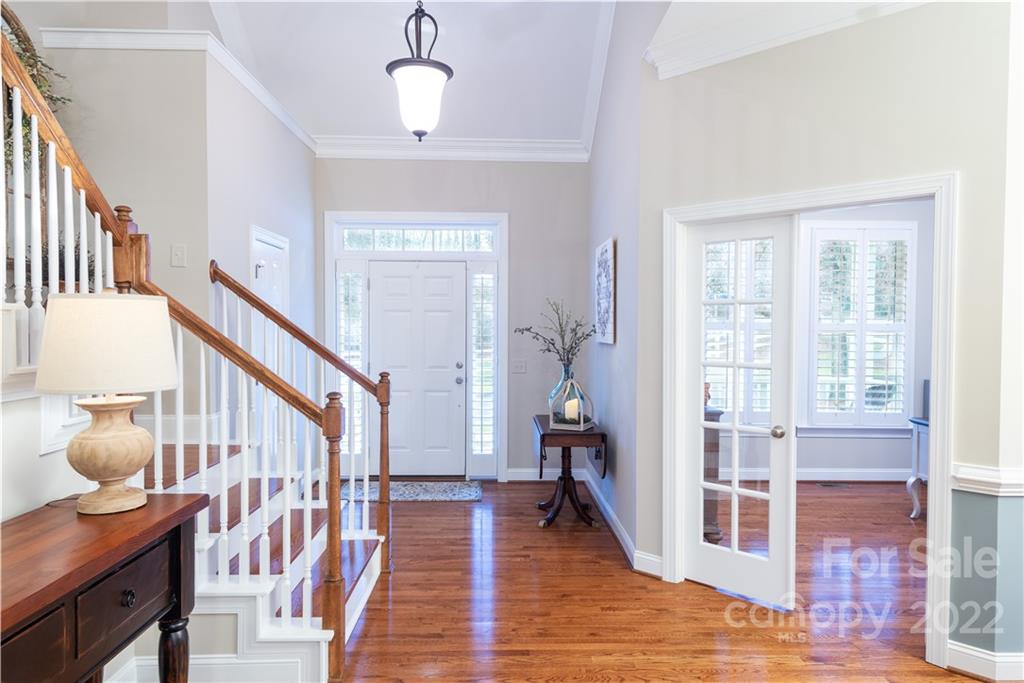 930 Stratford Run Drive Fort Mill, SC 29708 - Photo 3 of 28 a view of an entryway wooden floor and a living room