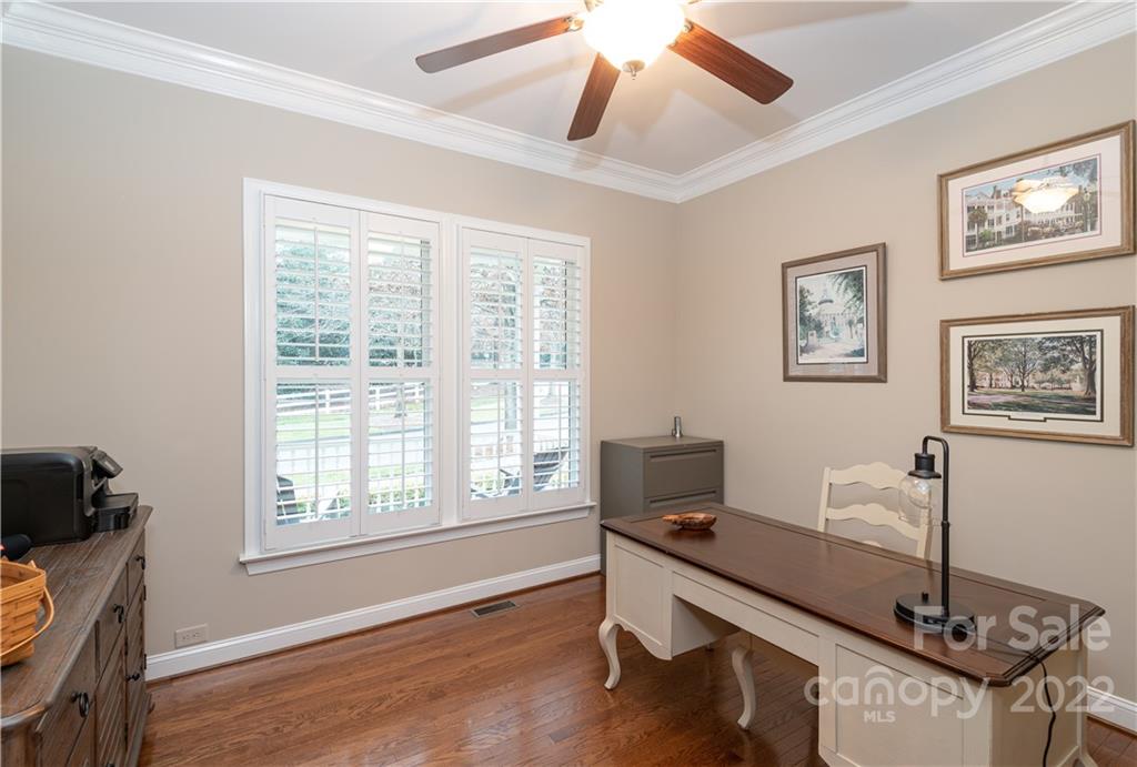 930 Stratford Run Drive Fort Mill, SC 29708 - Photo 4 of 28 a view of a workspace with furniture and a window