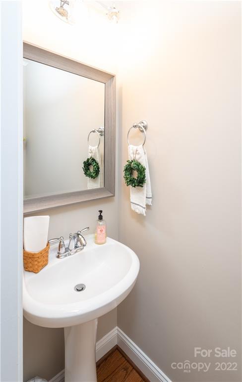 930 Stratford Run Drive Fort Mill, SC 29708 - Photo 7 of 28 a bathroom with a sink and a mirror