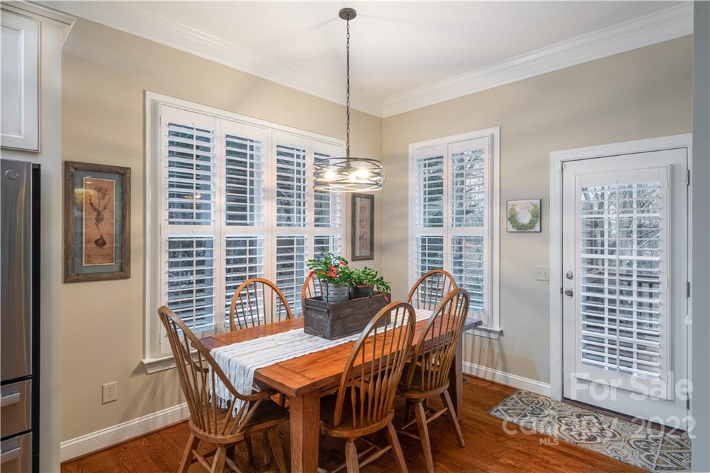 930 Stratford Run Drive Fort Mill, SC 29708 - Photo 9 of 28 a dining room with furniture and window