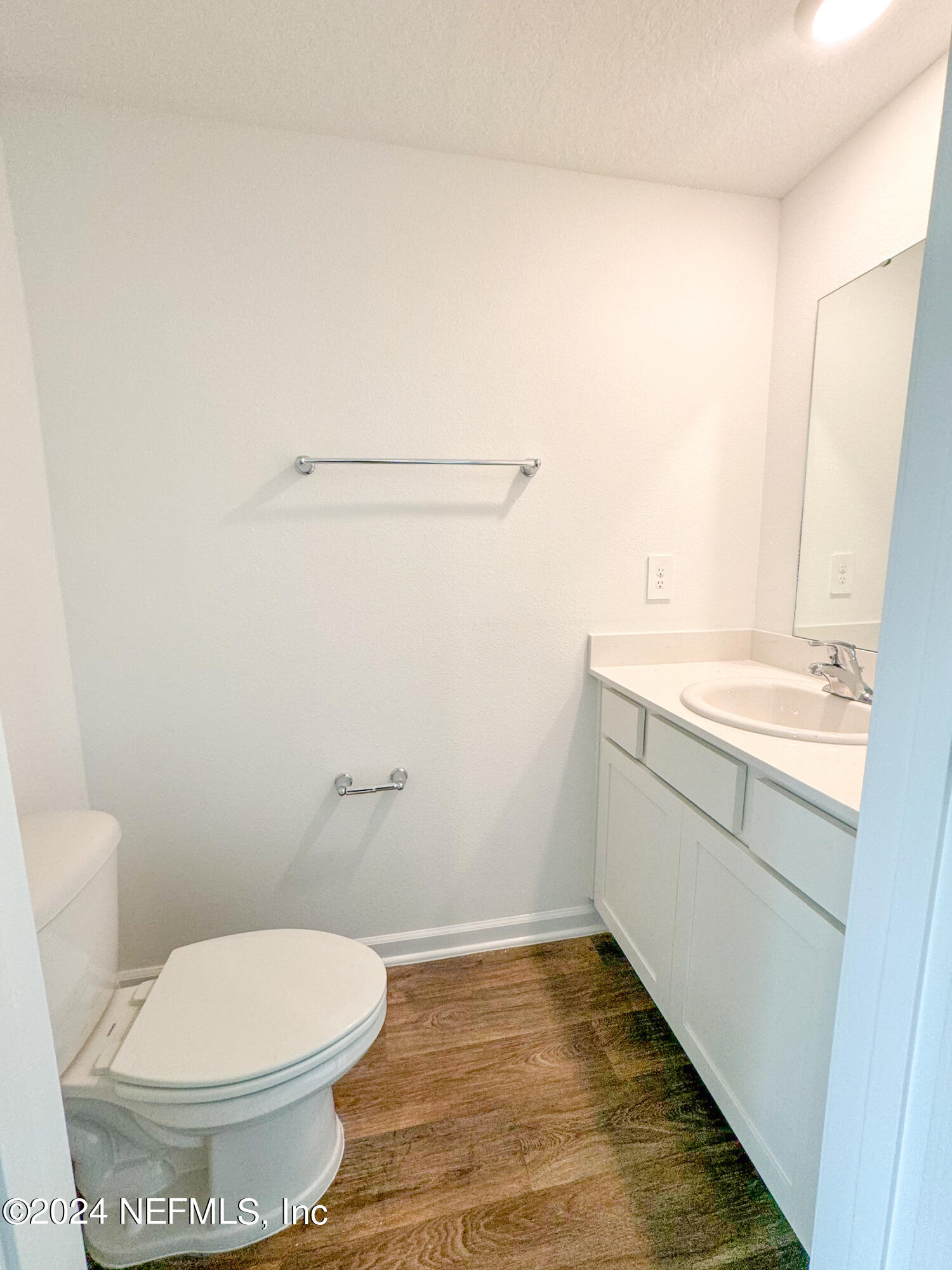 1633 Bridger Trace Middleburg, FL 32068 - Photo 15 of 26 a bathroom with a toilet and a sink