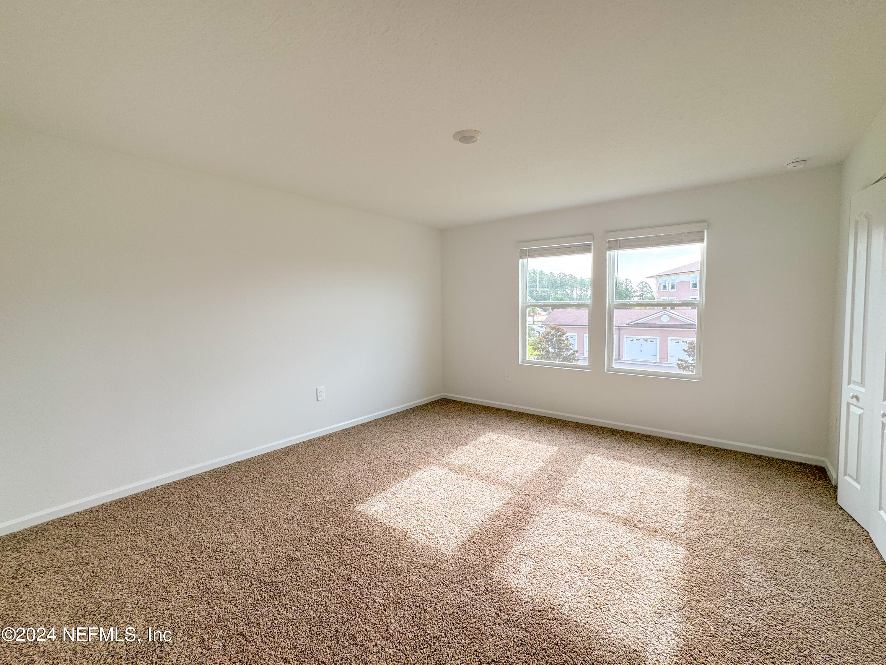 1633 Bridger Trace Middleburg, FL 32068 - Photo 16 of 26 an empty room with windows