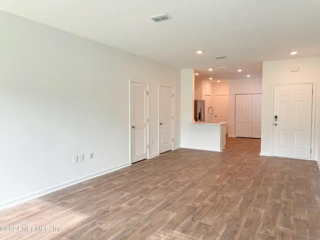 an empty room with windows