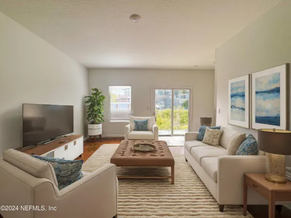 a kitchen with a refrigerator sink and microwave