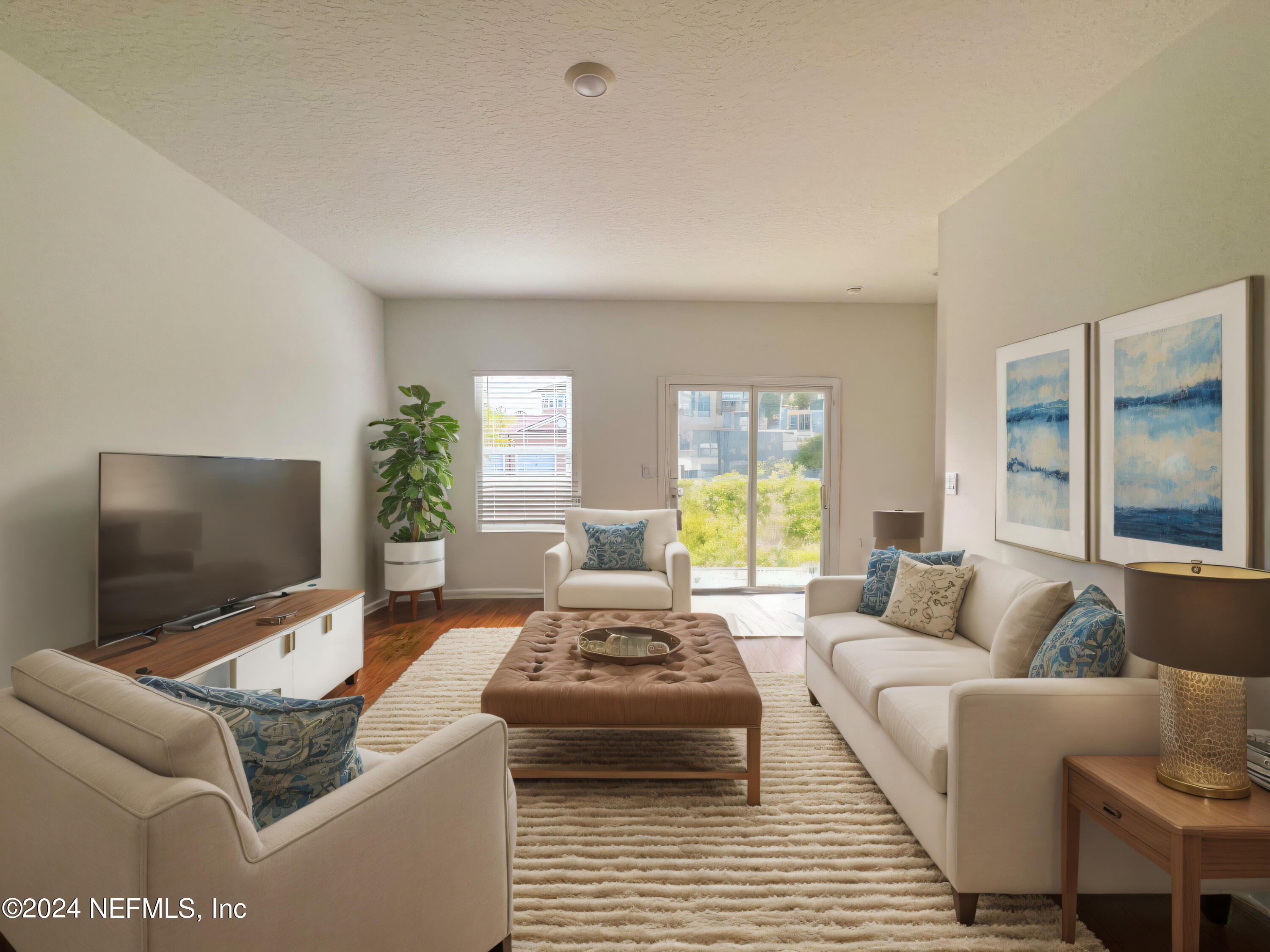 1633 Bridger Trace Middleburg, FL 32068 - Photo 9 of 26 a living room with furniture and a flat screen tv